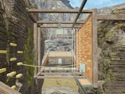 Gameplay of floating, climbing obstacle course suspended high above the ground in a rocky terrain