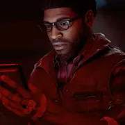 A 3D animated black man in a jacket and glasses, bathed in an eerie red light as he looks down at this phone