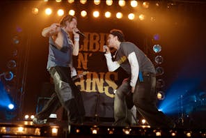 two men on stage rapping