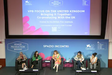 a panel of speakers, all female