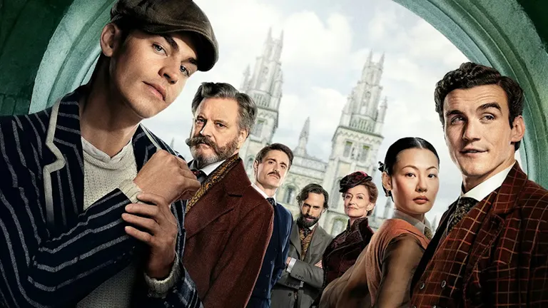 A group of people in 19th Century clothing standing in front of British architecture 