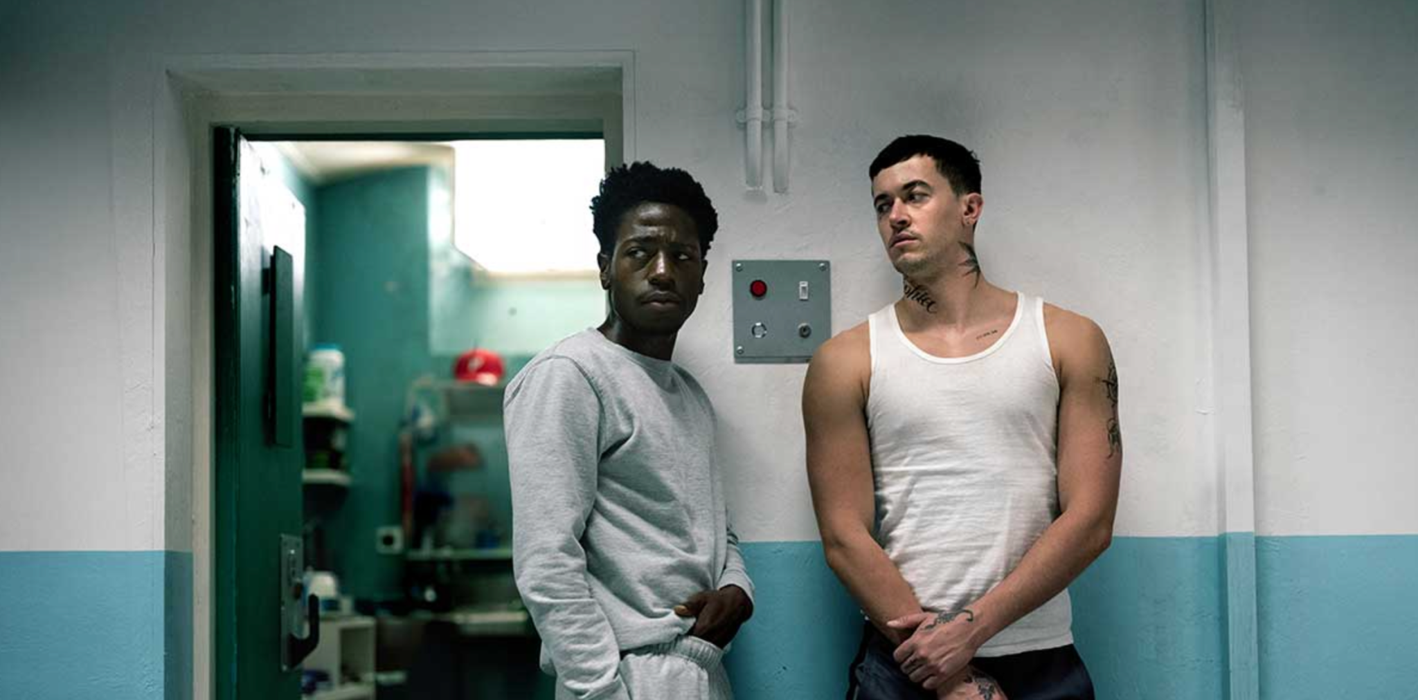 One black and one white man, both in prison