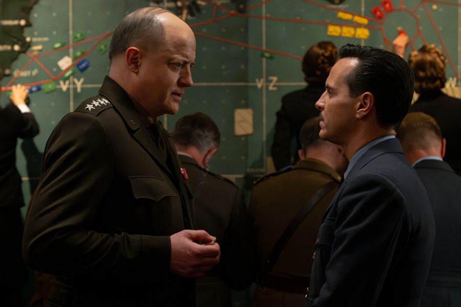 Two white men in Air force uniform facing each other, one visibly more senior