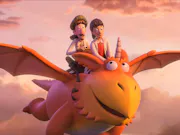 An animation of two white children on top of a flying orange winged monster