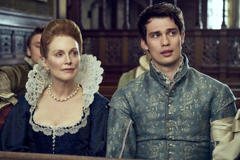 An older white woman and a young white man in fine 17th Century clothing
