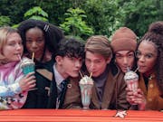 Three pairs of young people each share a milkshake.