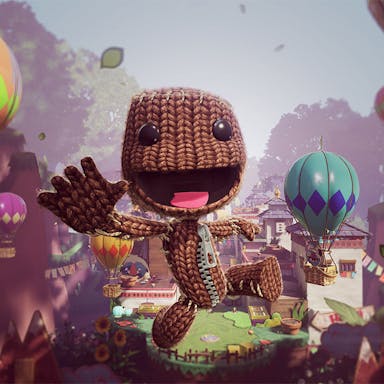 Animated video game image of a knitted creature flying through the air, smiling, with hot air balloons all around him in the sky. 