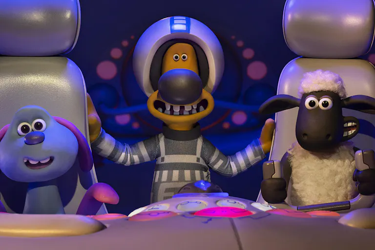 Claymation of characters, a bunny-type, dog and sheep, sitting in a spaceship