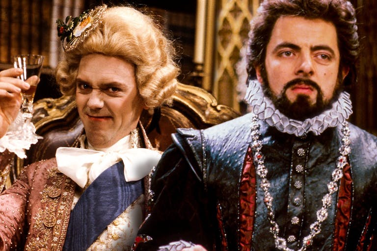 Two white men in ostentatious Elizabethan clothing