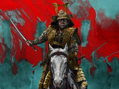An older Japanese man in elegant armour sitting on a white horse brandishing a sword, with red and blue background silhouette of other soldiers
