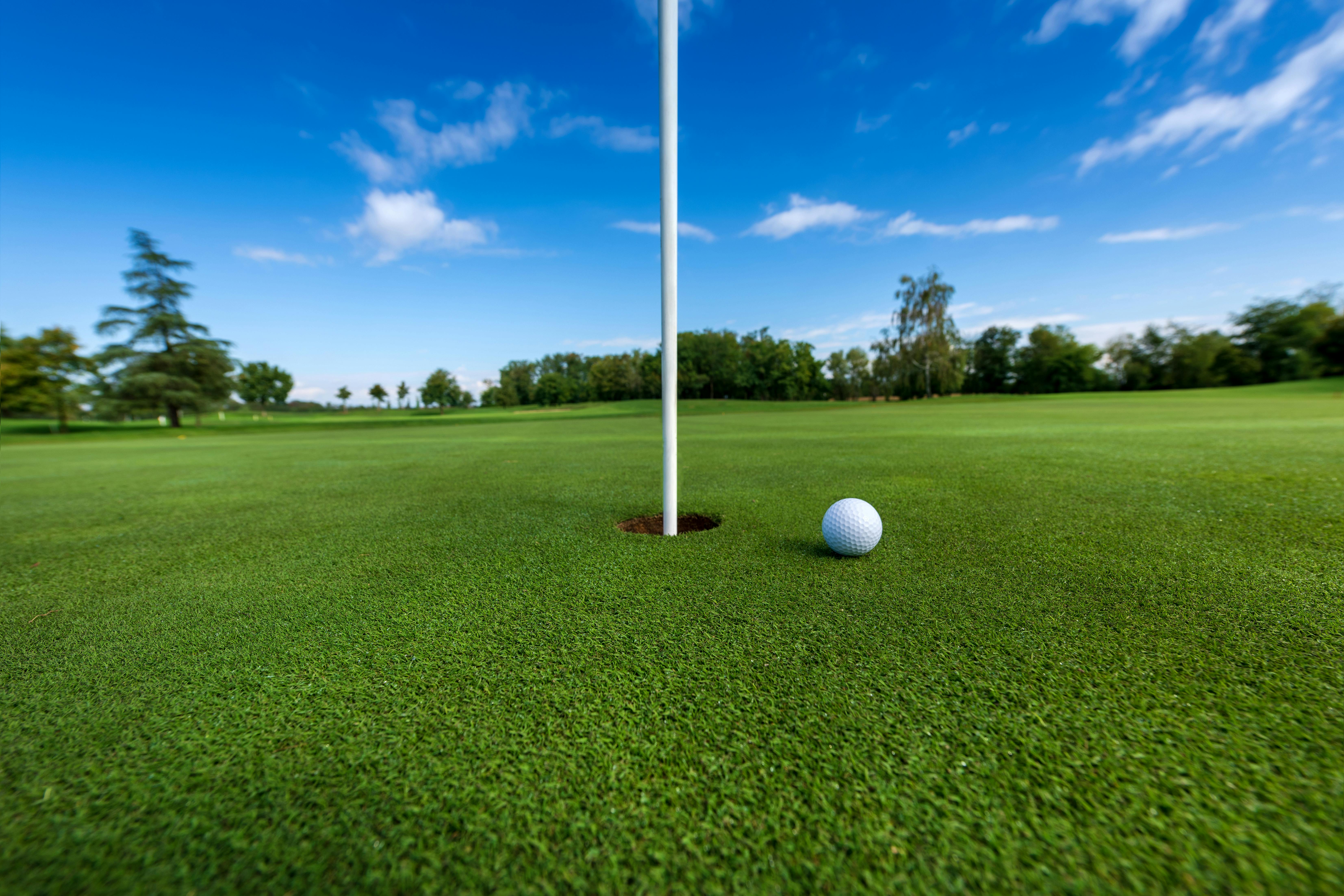 Golf ball near hole