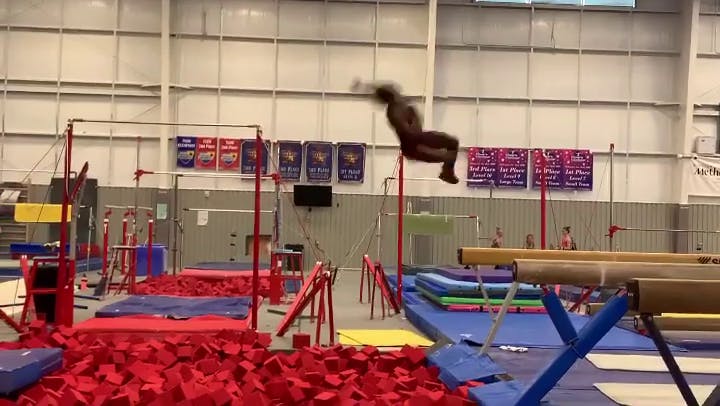 Simone Biles doing a triple-double