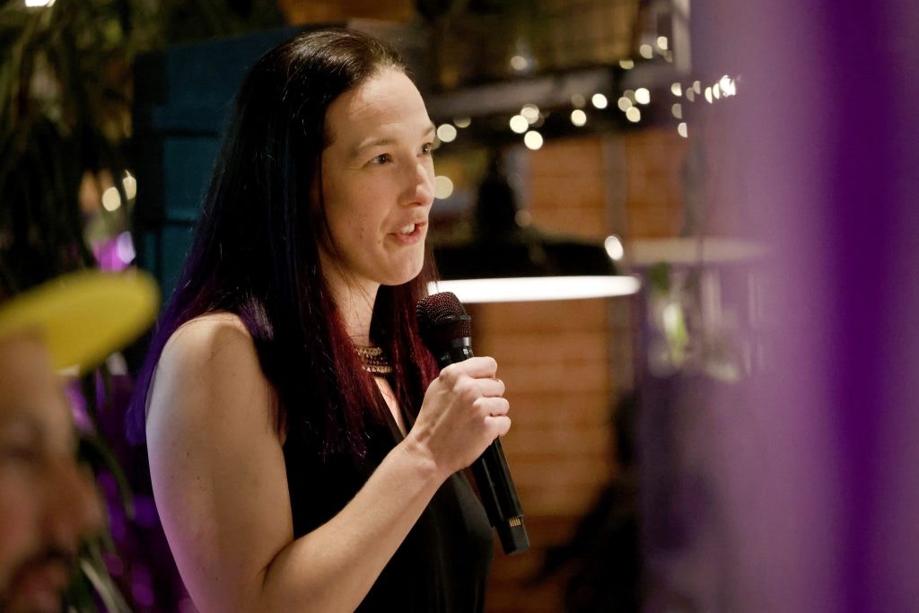 CEO of Rockinghorse charity speaking at an event.