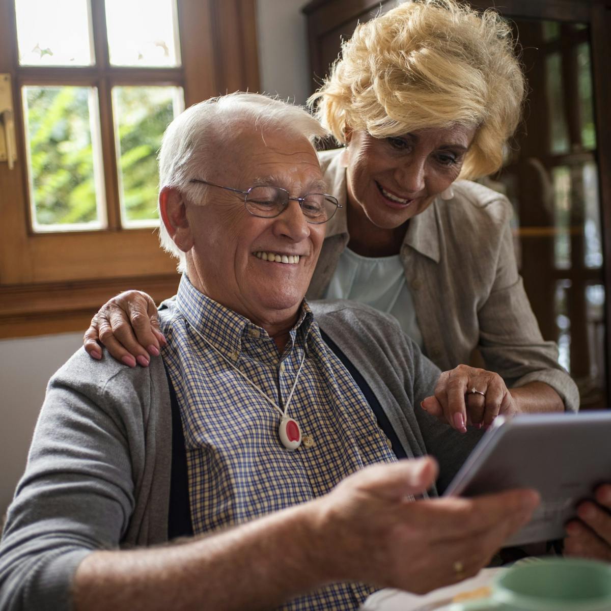 old man wearing a mi-guardian personal alarm