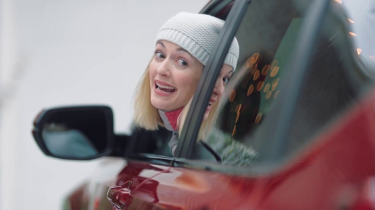 A woman looks out the window of a Honda Accord in a commercial edited by Will Cyr.