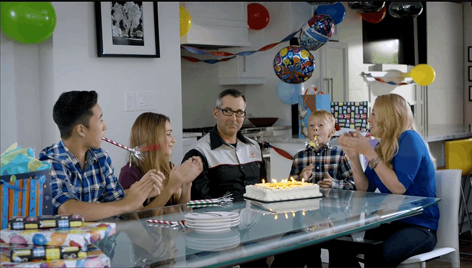 A family sits around a table for a birthday party in a commercial for Canadian Tire edited by Will Cyr.