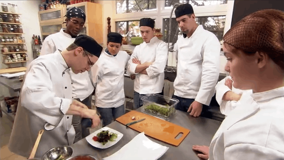 Chef Yannick Ouellet demos to students in documentary series Croquez la Gaspésie.