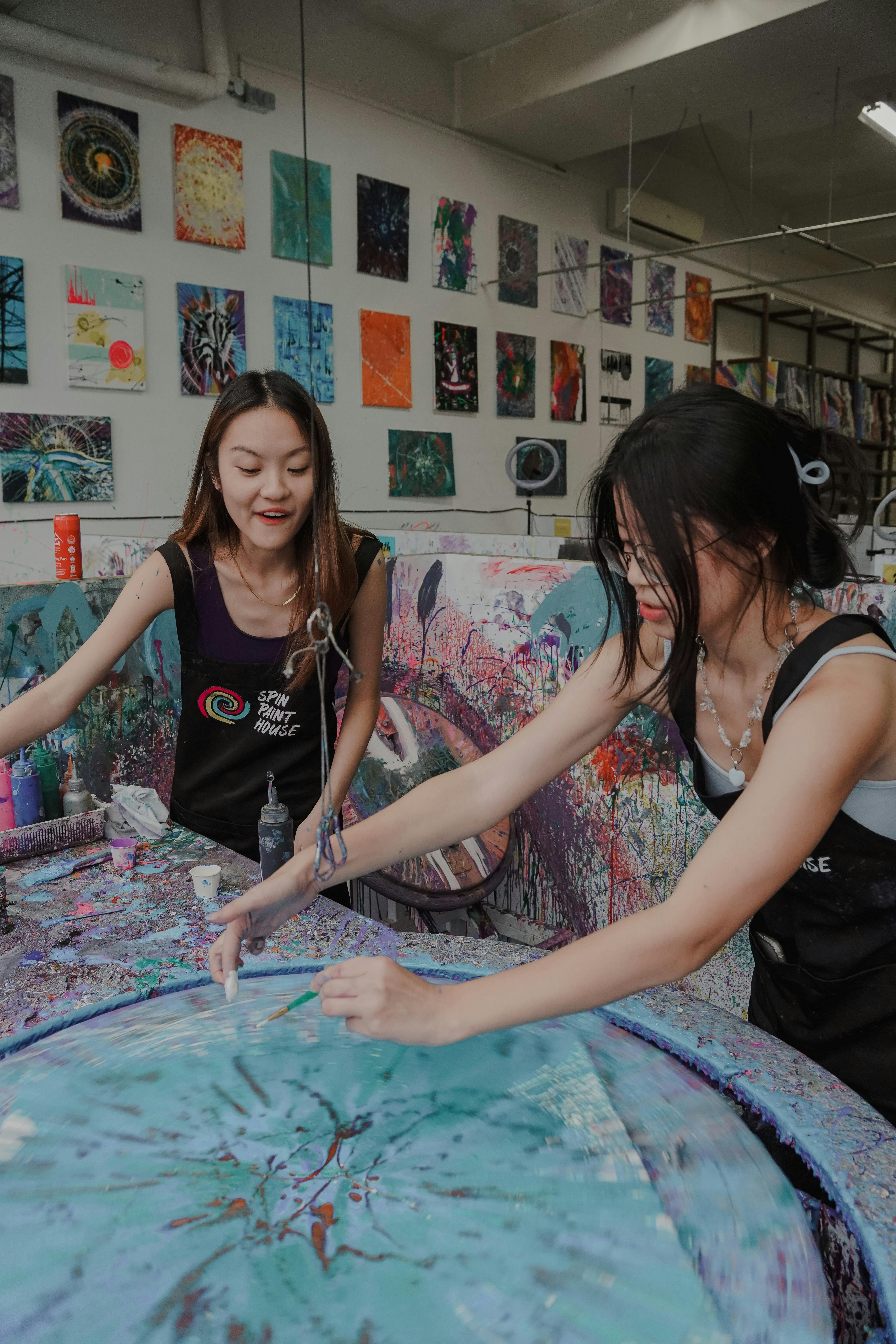 Spin together to paint your one-of-a-kind art creation