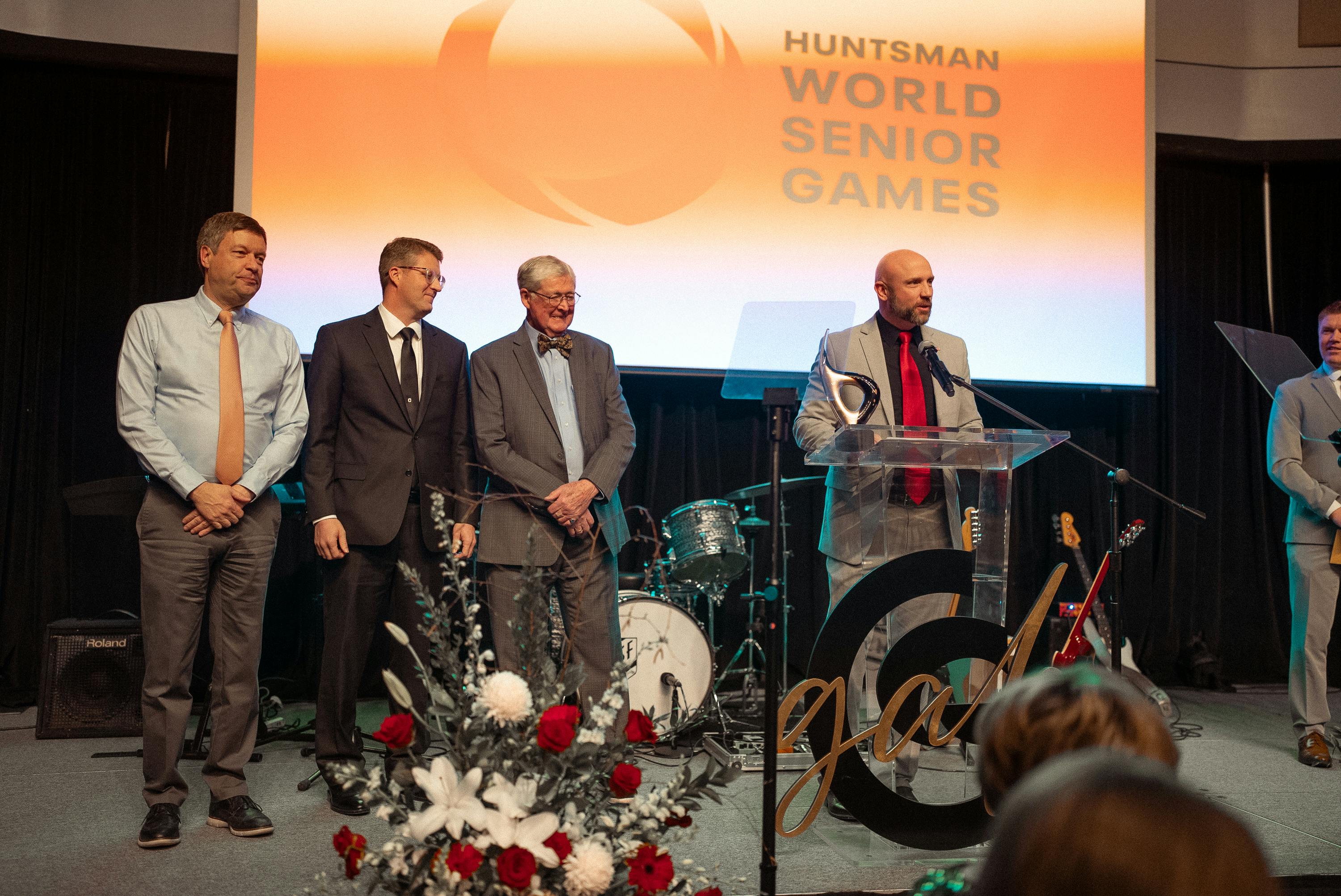 CEO, Kyle M Case, accepts the Paragon award on behalf of the Huntsman World Senior Games