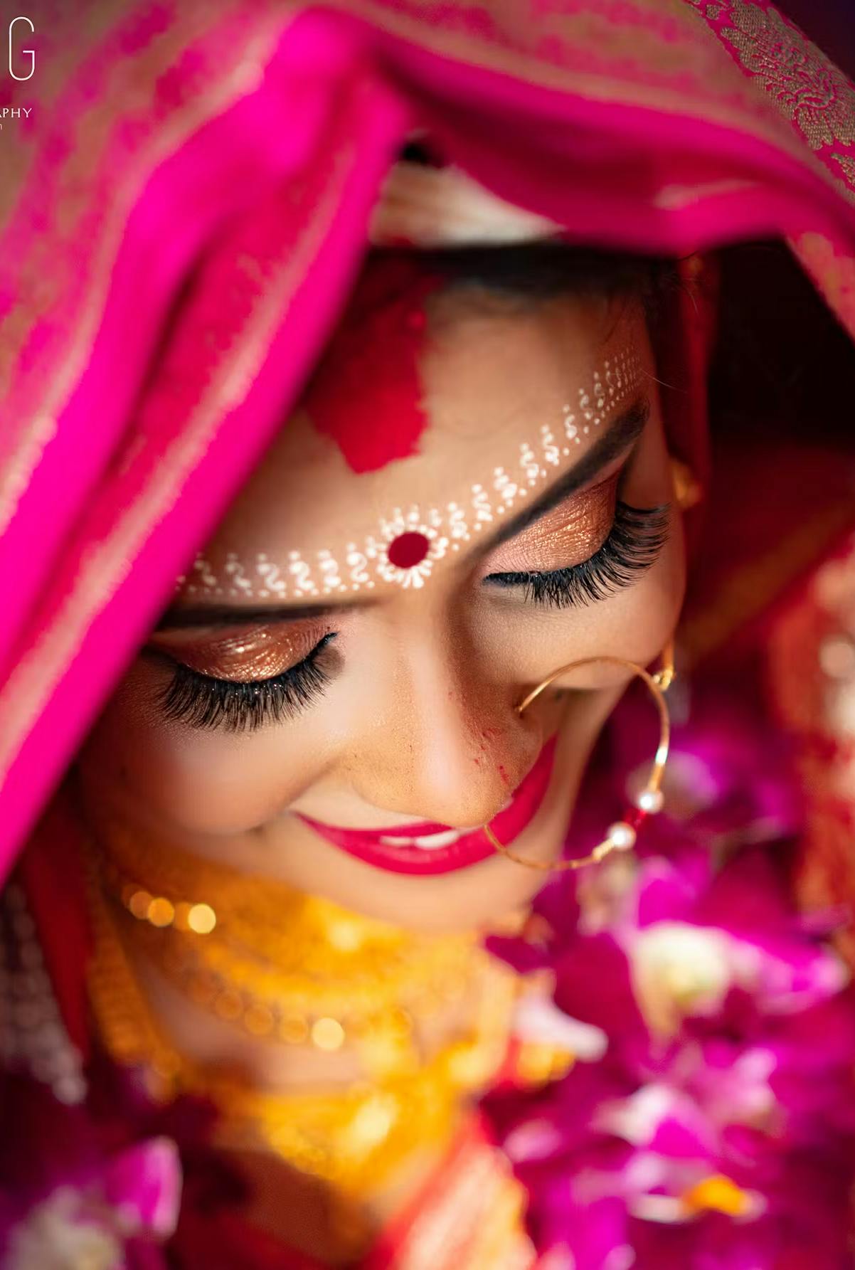 Bengali bride posing for pictures