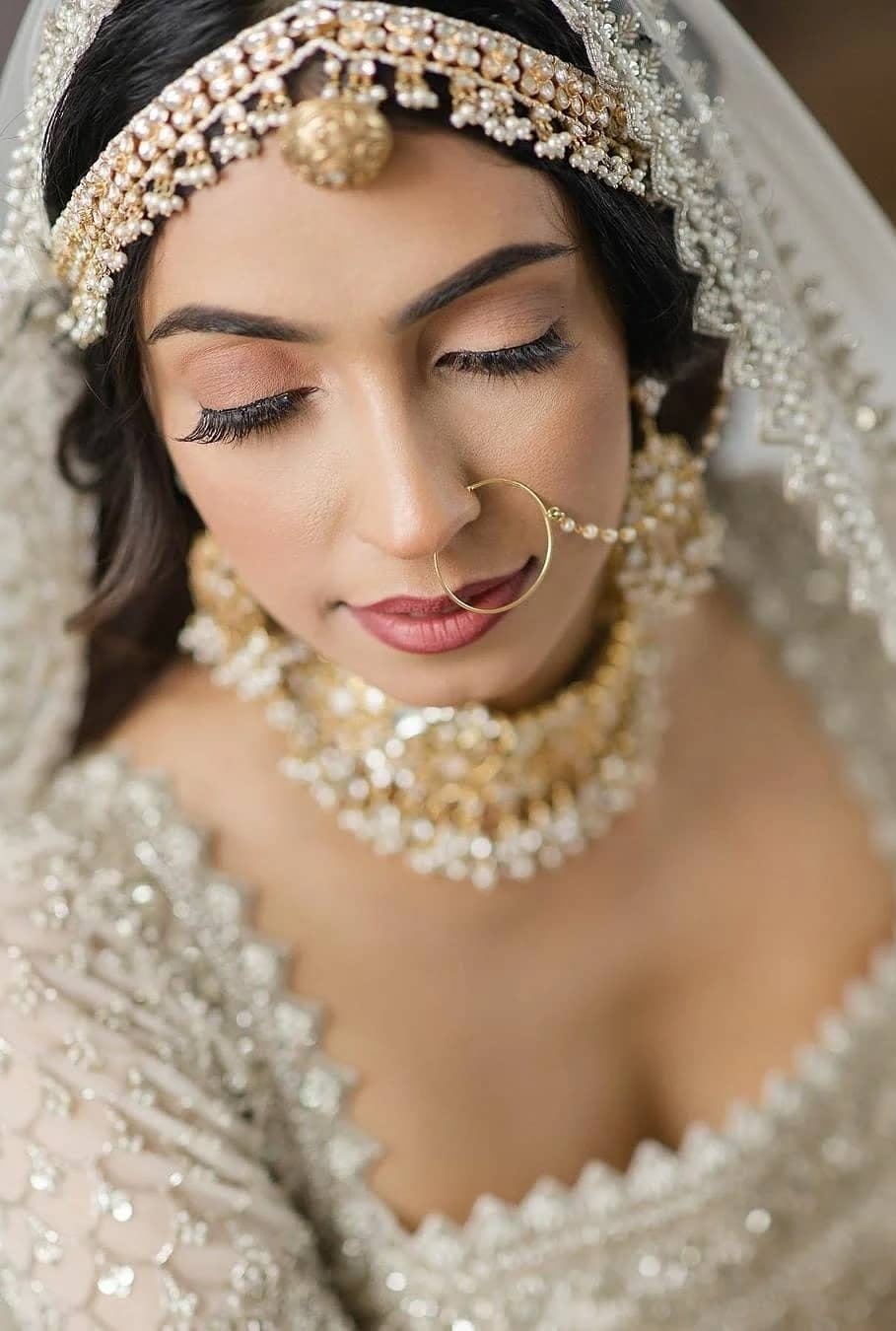  bridal look in a beautiful ivory Lehenga choli.