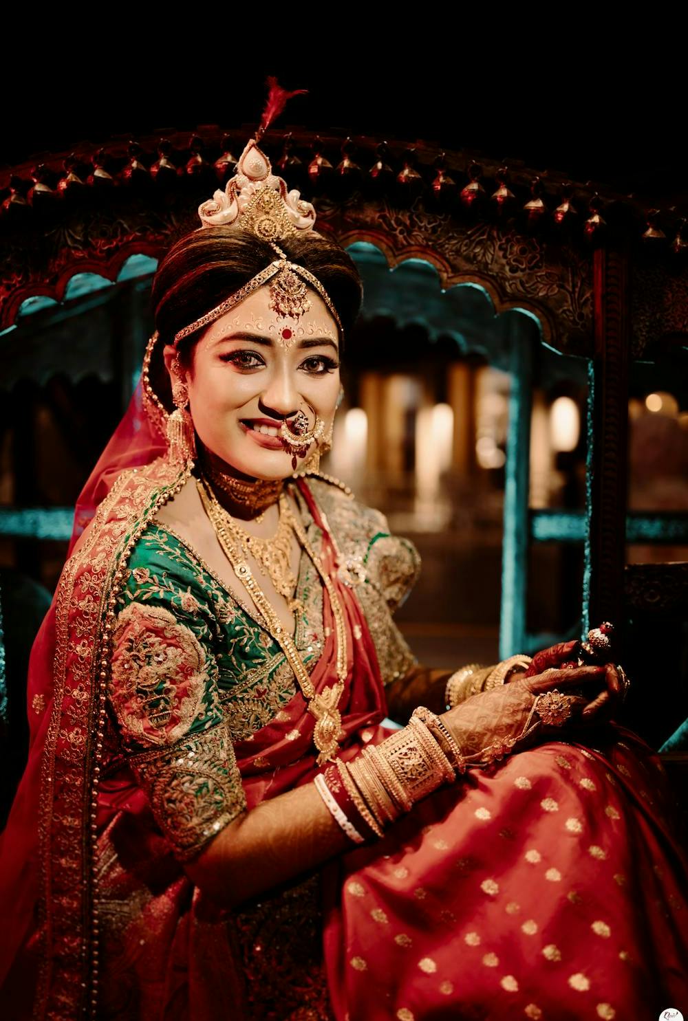 bengali bride showcasing her jewellery 