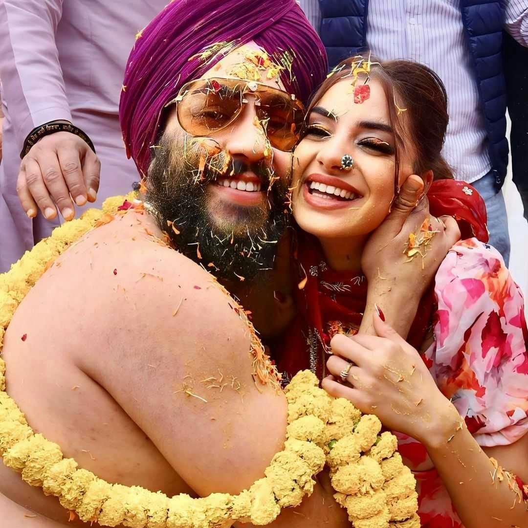 Lovely couple in haldi poses