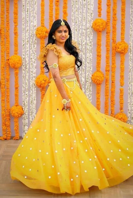 Swirling bride in yellow dress pic