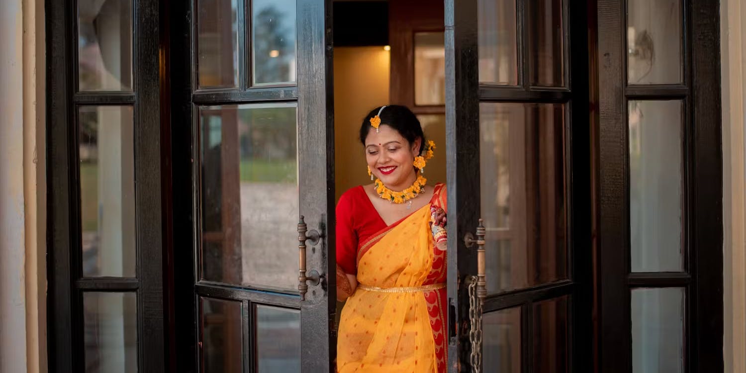 Shy bride in haldi outfit image