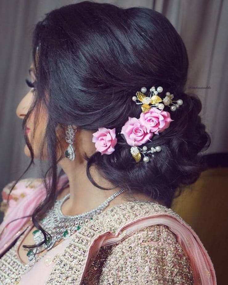 Floral messy updo hairstyle