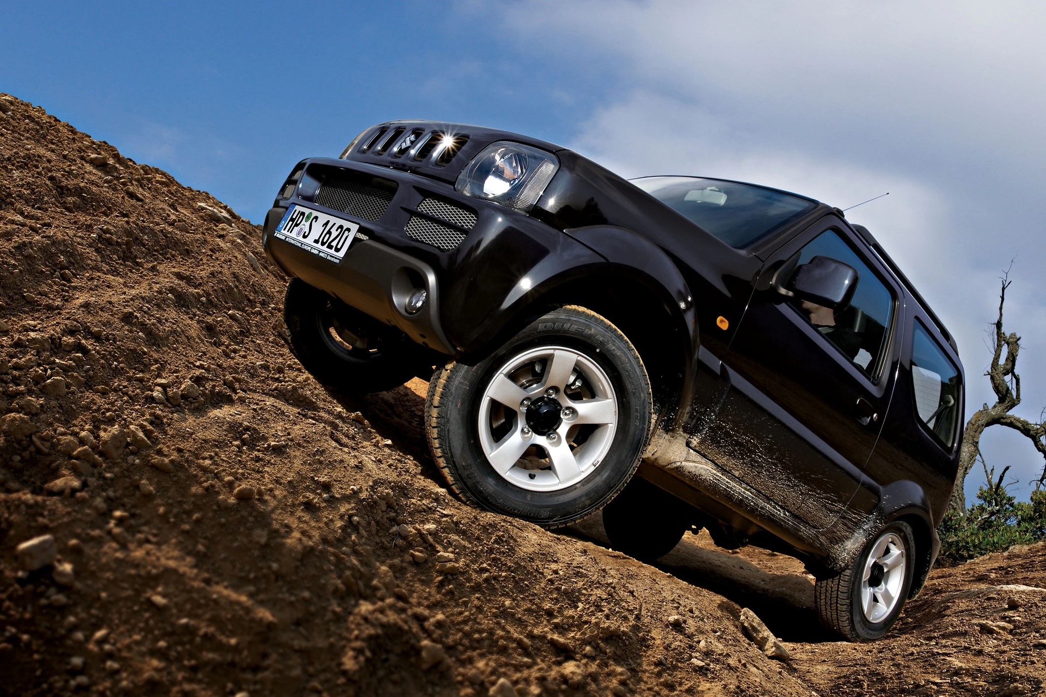 Suzuki Jimny FJ Aussenansicht Seite schräg statisch schwarz