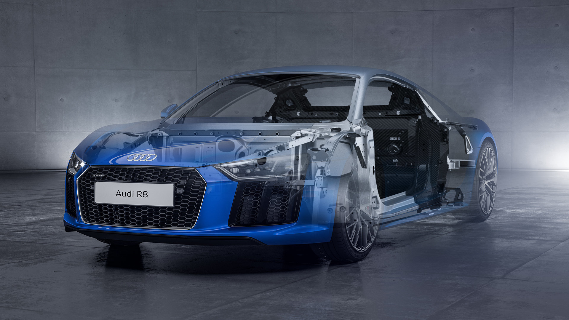 Blauer Audi R8 mit halbtransparentem Chassis, das die innere Struktur und Technik des Fahrzeugs zeigt, in einem grauen, modernen Raum.