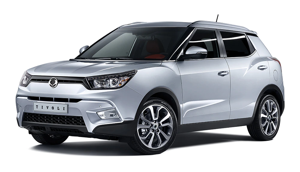 Silberner SUV, stilvolles Design mit schwarzen und roten Akzenten, in seitlicher Ansicht vor weißem Hintergrund.