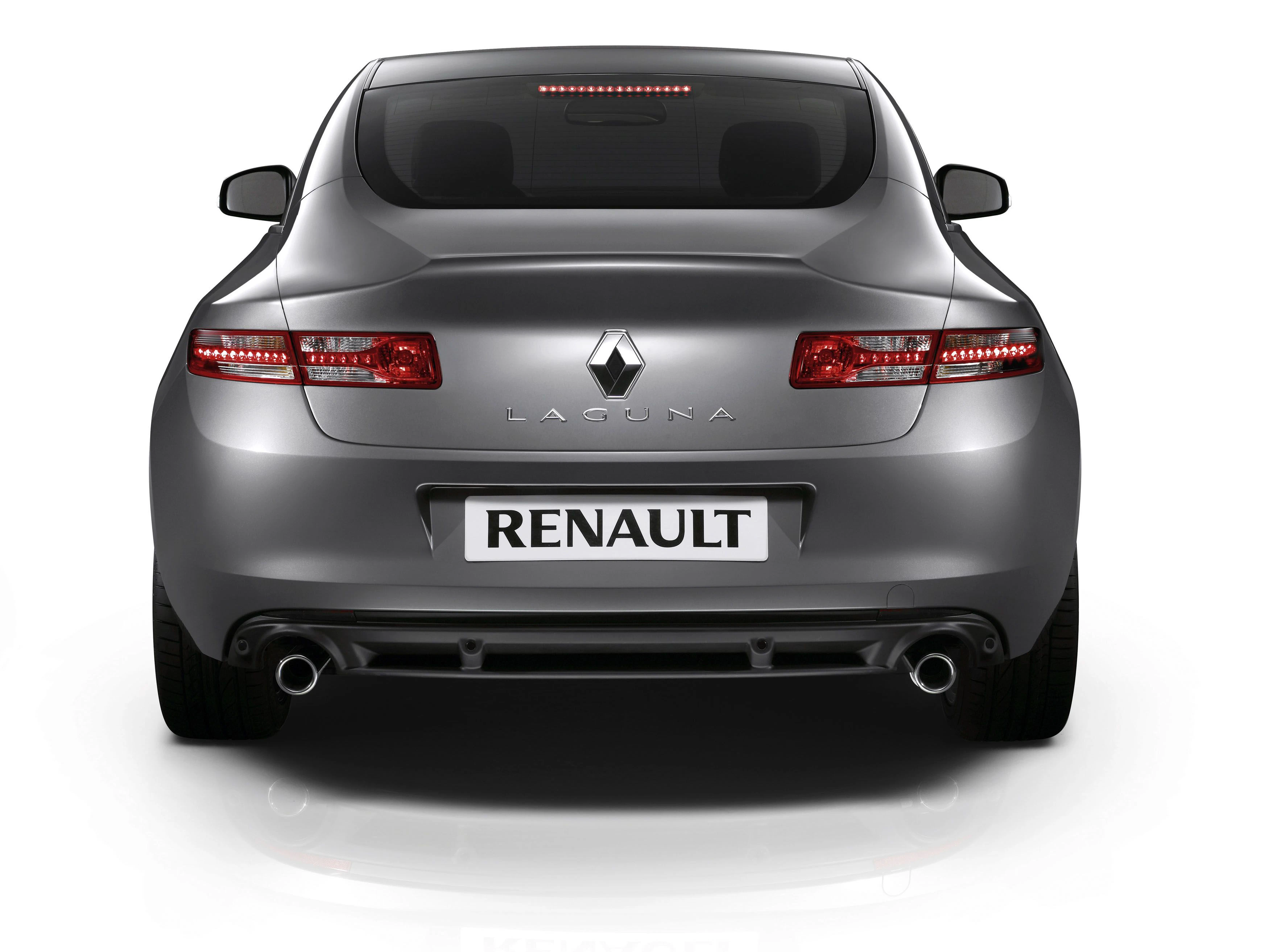 Rückansicht eines grauen Renault Laguna Autos mit glänzender Lackierung und Doppelauspuff, beleuchtetem Markenzeichen und klaren Rücklichtern.