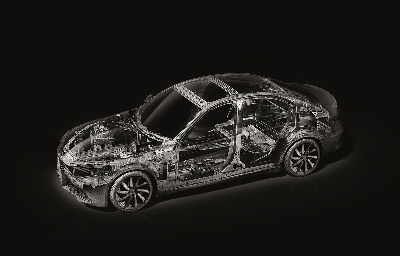 Transparente Darstellung eines Autos mit sichtbaren inneren Strukturen und Komponenten, auf schwarzen Hintergrund.