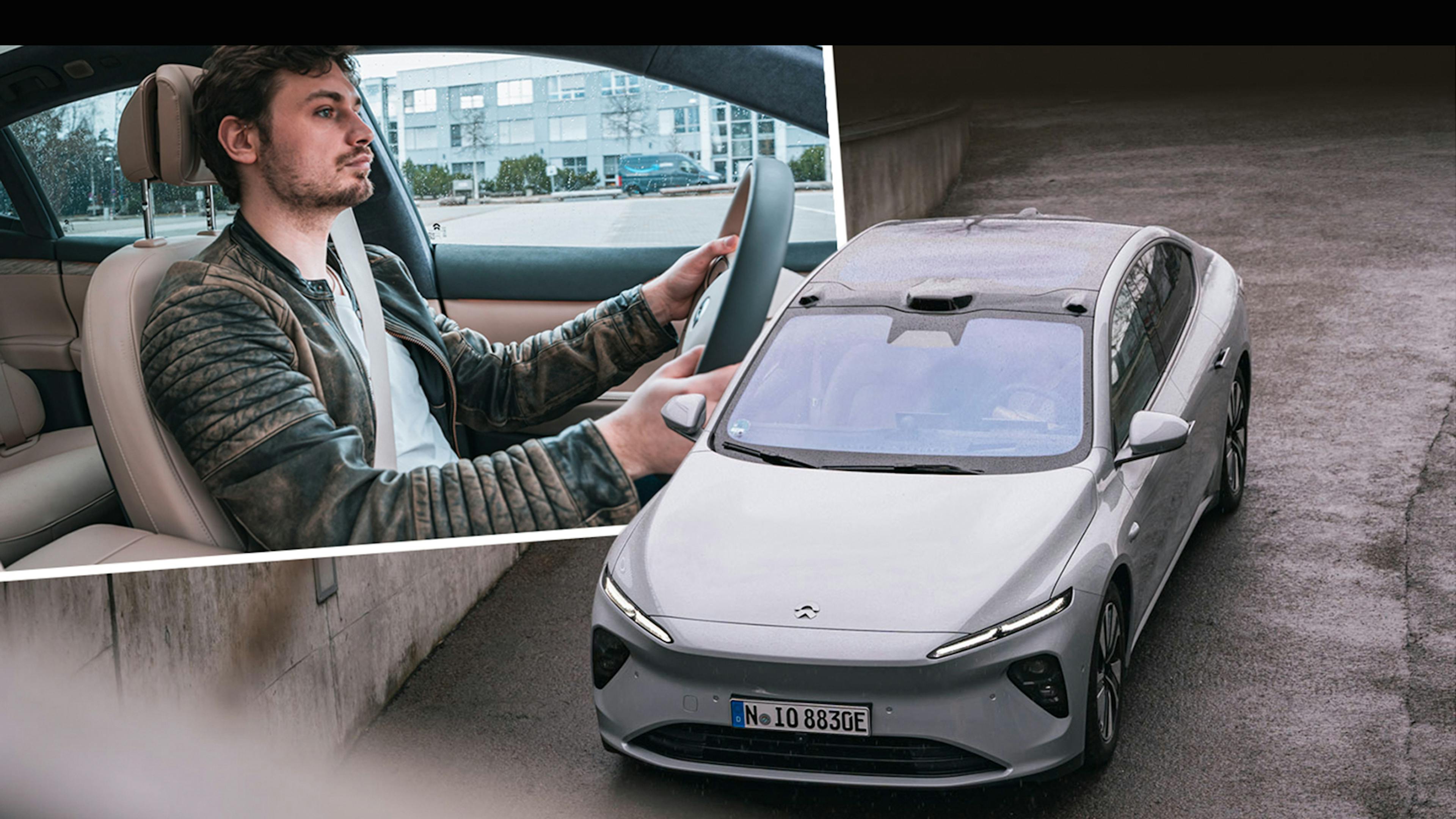 Grauer Nio ET 7 fährt in Tiefgarage, Redakteur Connor Meißner sitzt am Steuer