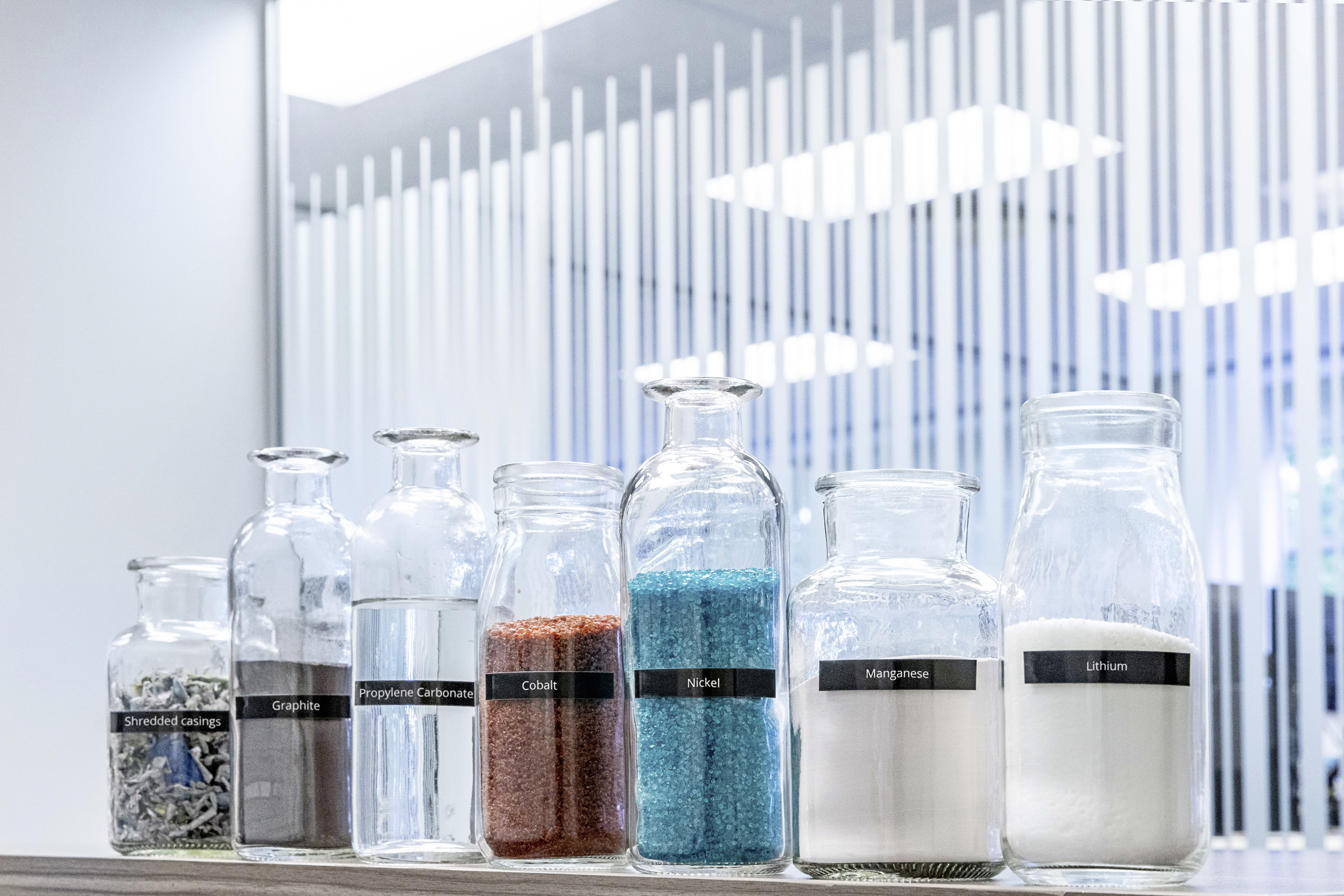Glasses with nickel, cobalt, lithium and other materials in a laboratory.
