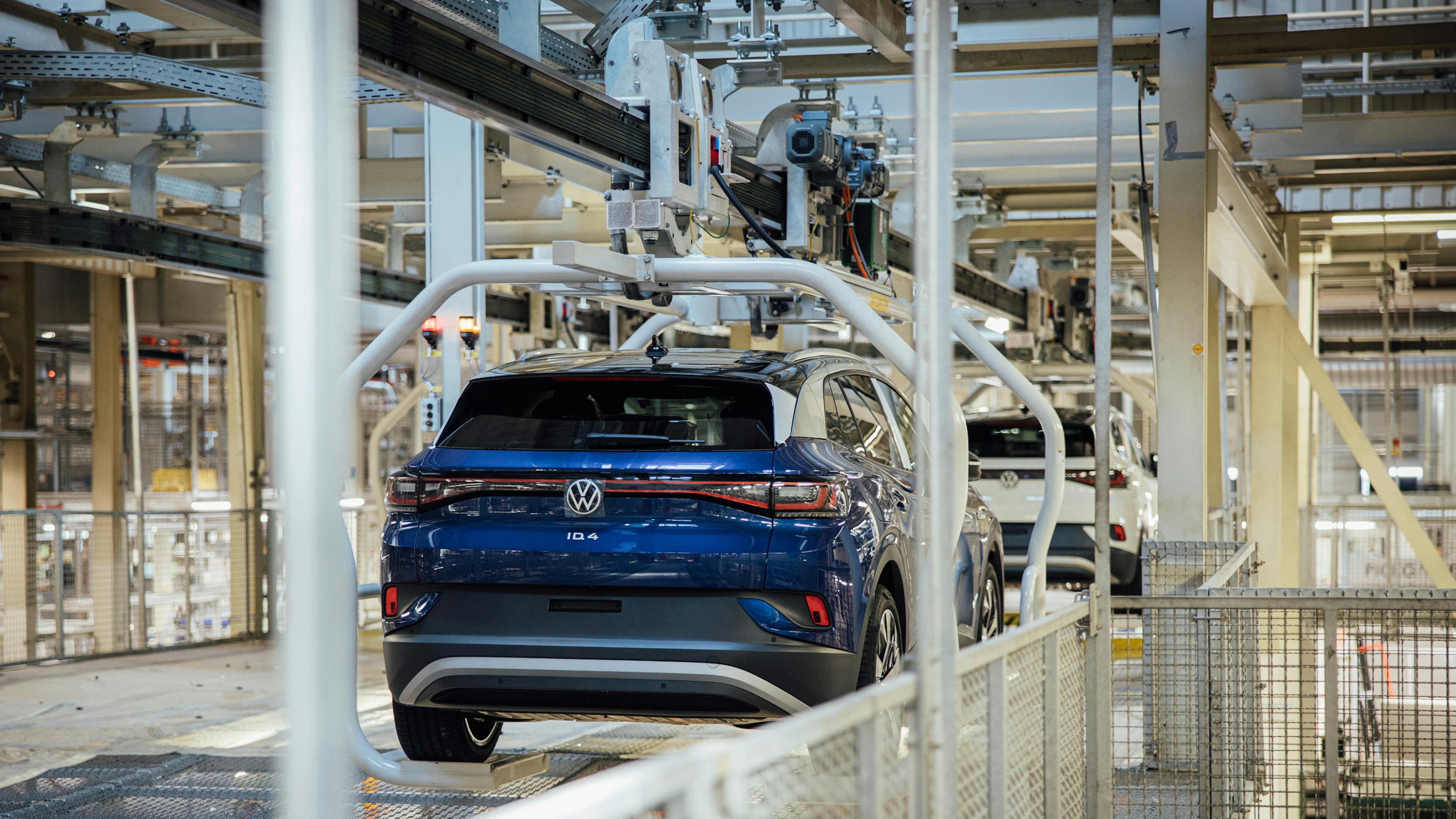 A blue VW ID.4 on the production line in a VW factory.