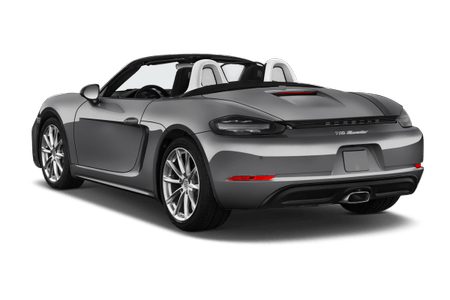 Grauer Sportwagen mit offenem Verdeck, zweiseitiger Auspuff und eleganten Linien. Sicht von hinten links.