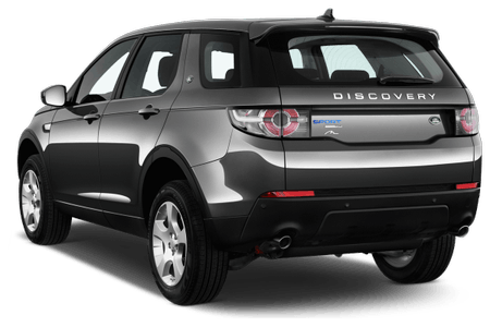 Silberner SUV Discovery von hinten, geparkt auf weißem Hintergrund. Sichtbar sind Rücklichter und Emblem.