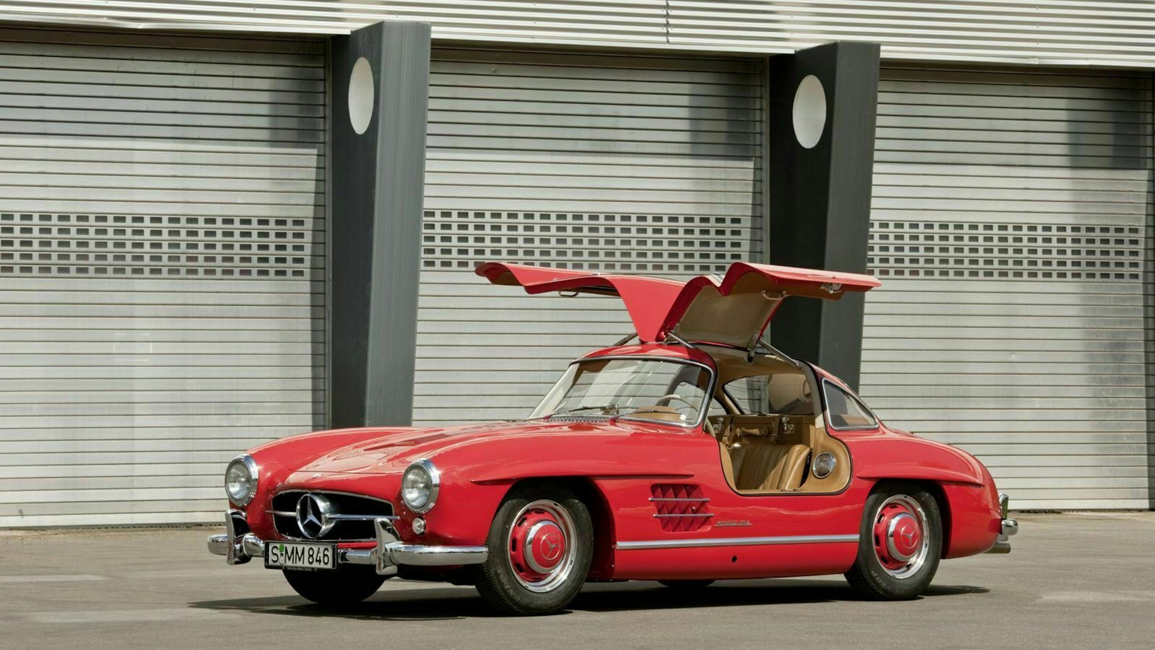 The Mercedes 300 SL in side view with open gullwing doors