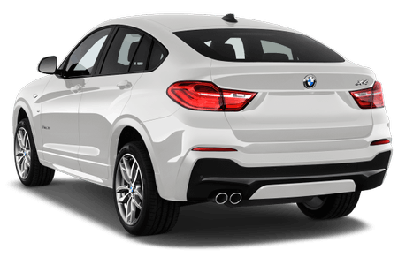 Weißer BMW X6 aus schrägem Blickwinkel von hinten, zeigt sportliches Design, rote Rücklichter und Auspuffrohre.