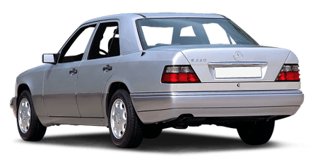 Silberner Mercedes-Benz E-Klasse W124, Heckansicht, mit runden Rückleuchten und Markenemblem auf dem Kofferraumdeckel.