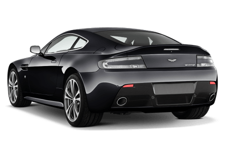 Schwarzer Sportwagen, elegante Karosserie, zwei Türen, markanter Heckdiffusor und Doppelauspuff. Rückansicht.