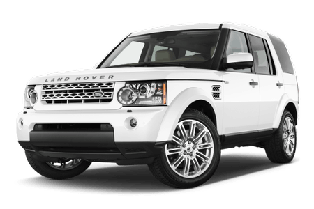 Weißer Land Rover Discovery vor weißem Hintergrund, Vorderansicht seitlich. SUV mit charakteristischen runden Scheinwerfern und markantem Kühlergrill.