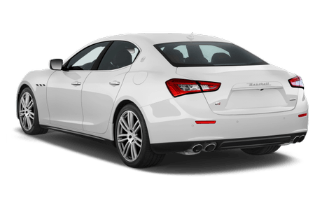 Weißes, elegantes Auto von hinten, mit sportlichem Design und Doppelrohrauspuff. Luxuriöser Stil und glatte Linien.