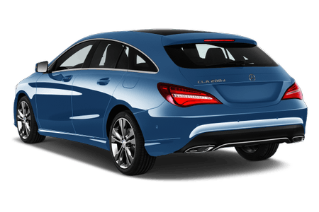 Blauer Kombi mit glänzendem Lack, modernem Design und Dachspoiler, betrachtet von hinten. LED-Rückleuchten und Doppelauspuff sind sichtbar.