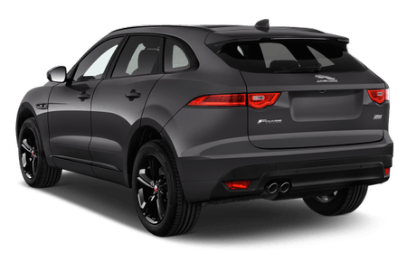 Grauer SUV mit sportlichem Design von schräg hinten. Markante Rückleuchten und Doppelauspuff.