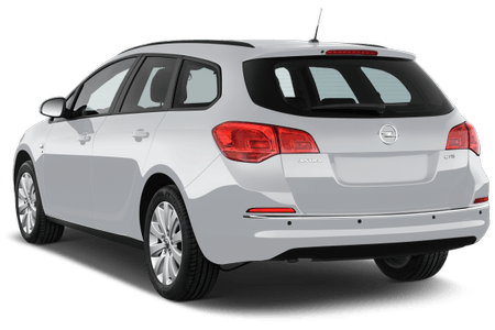 Silberner Kombi mit fünf Türen, geparkt, rückwärtige Seitenansicht. Er hat rote Rücklichter und eine schwarze Antenne auf dem Dach.