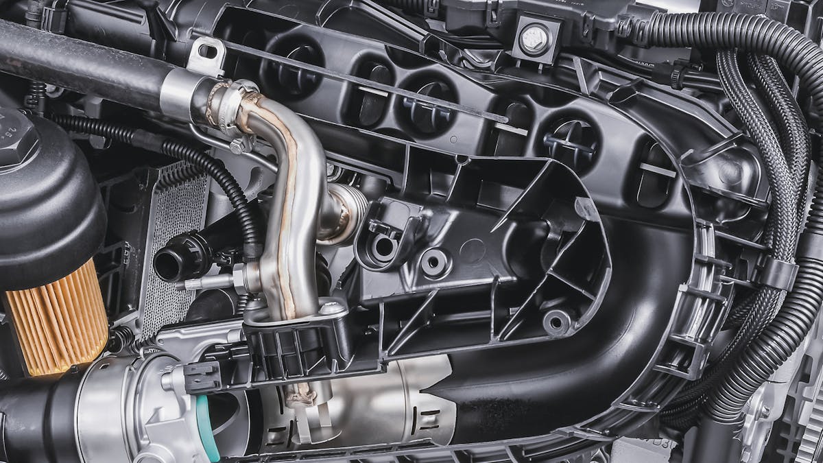 Das Abgasrückführungsventil eines BMW-Reihensechszylinderdieselmotor im Schnittmodell.
